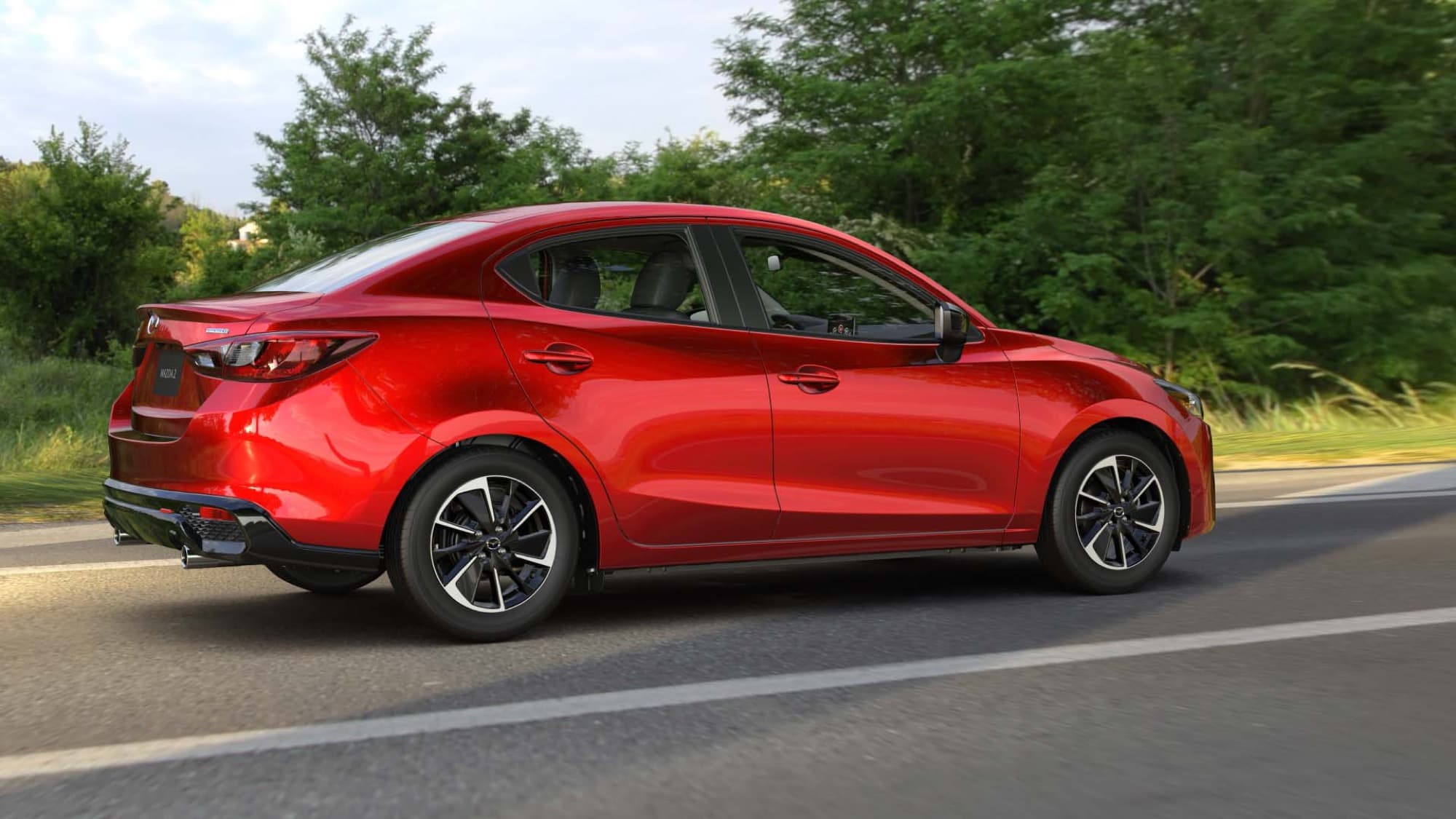 Mazda2 Sedán — vista 2